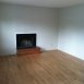 living area with hardwood floors and fire place
