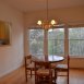 The dining area has a pass through to the kitchen.
