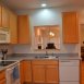 Another view of the kitchen showing the pass through to the dining area.