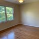 One of the 3 bedrooms on the 2nd floor-all bedrooms have ceiling fans, good windows and are a good size.
