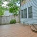 Awesome first floor deck with privacy fence surrounding it.