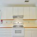 Kitchen has TONS of cabinets & counter space.