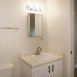Half bathroom with rear bedroom