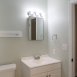 Half bathroom with rear bedroom