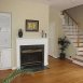 Family Room has a fireplace with gas logs and built in shelves.