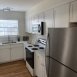 Recently renovated kitchen-NEW cabinets & Quartz counters! BEAUTIFUL!  All appliances including a built in microwave.